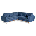 The Maddox Sectional is an elegant blue L-shaped sofa with plush cushions and wooden legs, ideal for any living room. With its modern silhouette and upholstered fabric, it brings a mid-century modern flair. Shown on a white background for clarity.