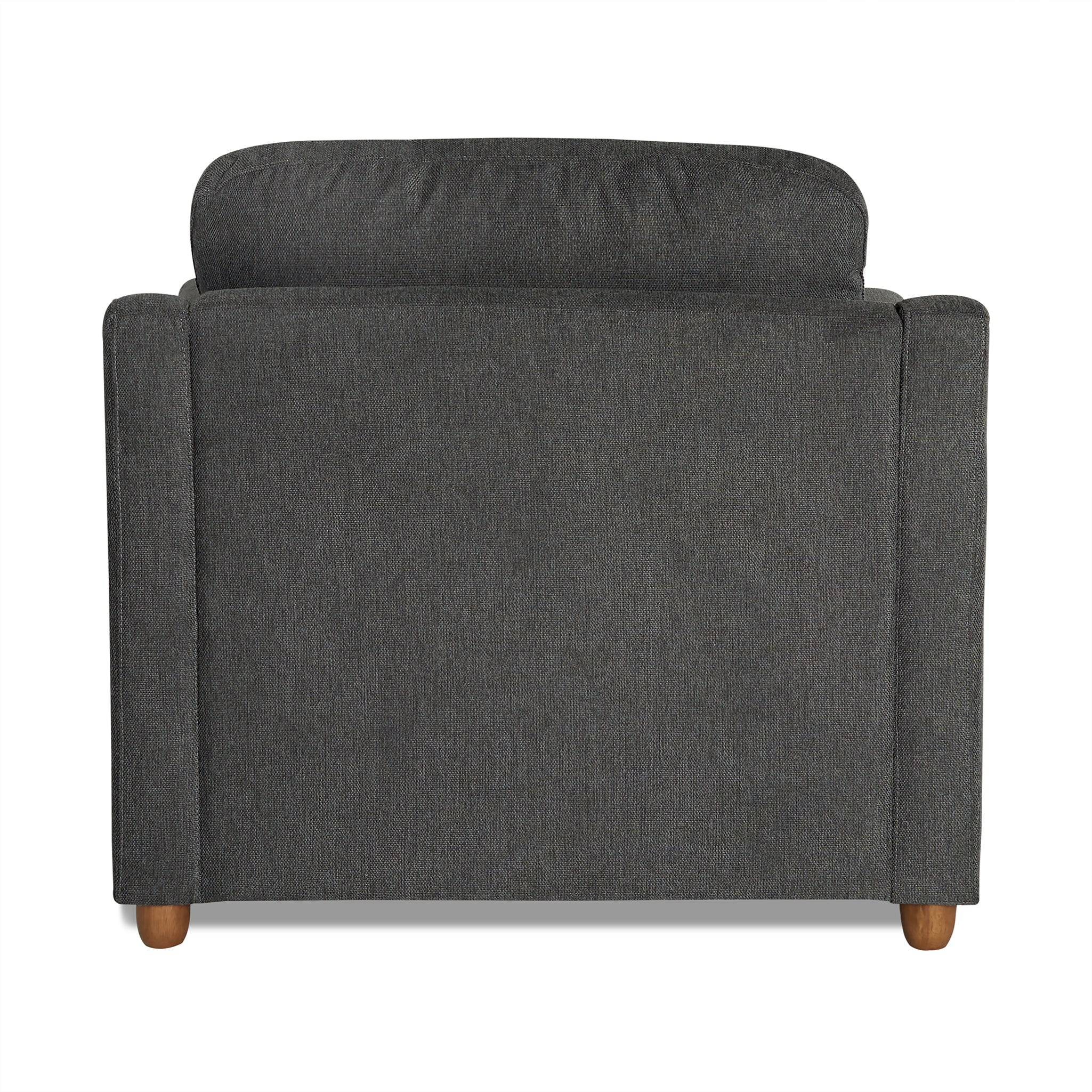 Back view of the My Cloud Slope Chair, a dark gray upholstered armchair with a cushioned backrest for customizable comfort and wooden legs, set against a plain white background.