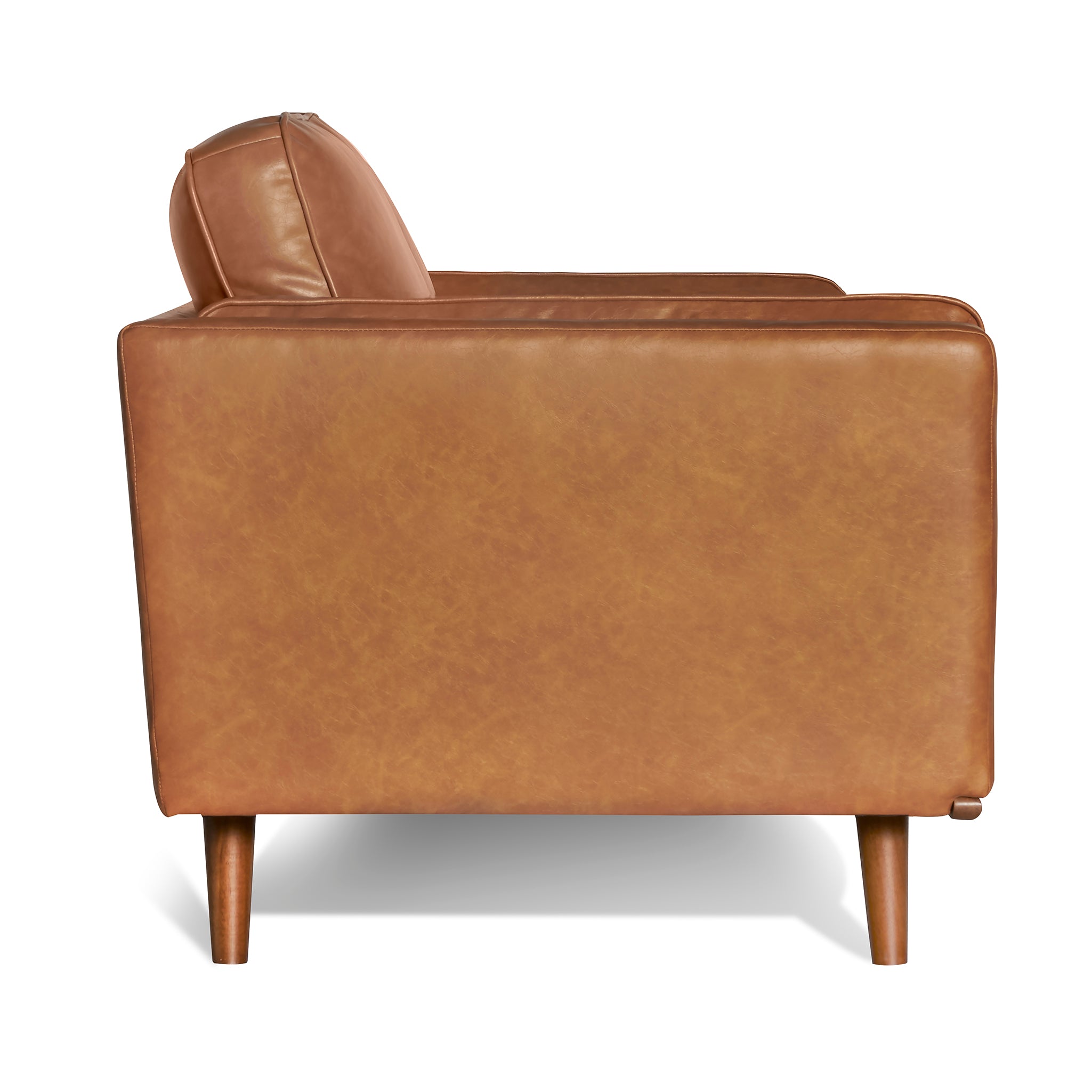 The Maddox Loveseat boasts a mid-century modern design with clean lines, brown leather upholstery, and wooden legs. Its durable construction exudes a sleek, minimalist appeal.