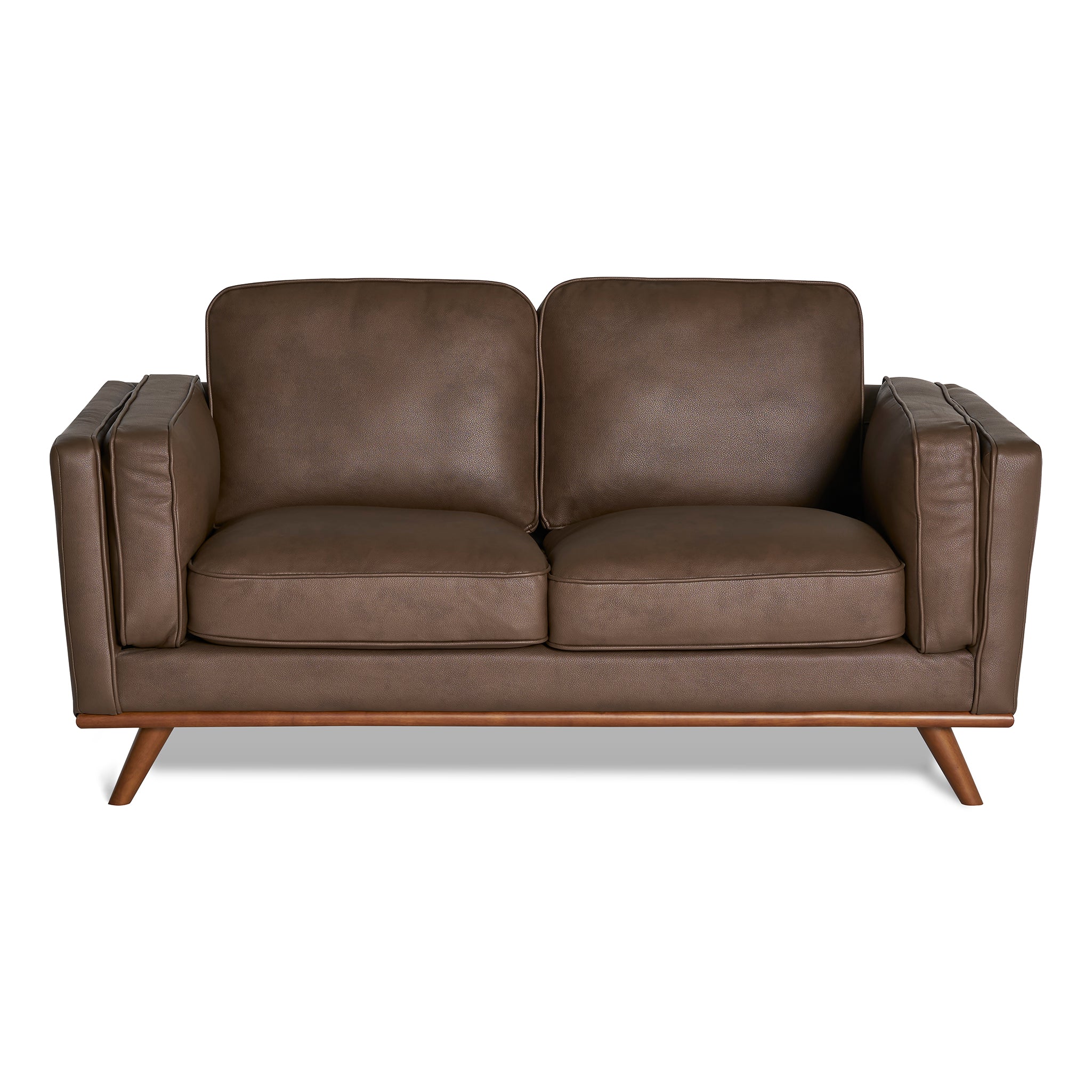 The Maddox Loveseat is a brown leather piece featuring a mid-century modern design, with two seat and back cushions, angular armrests, and four wooden legs for contemporary aesthetics and durability.