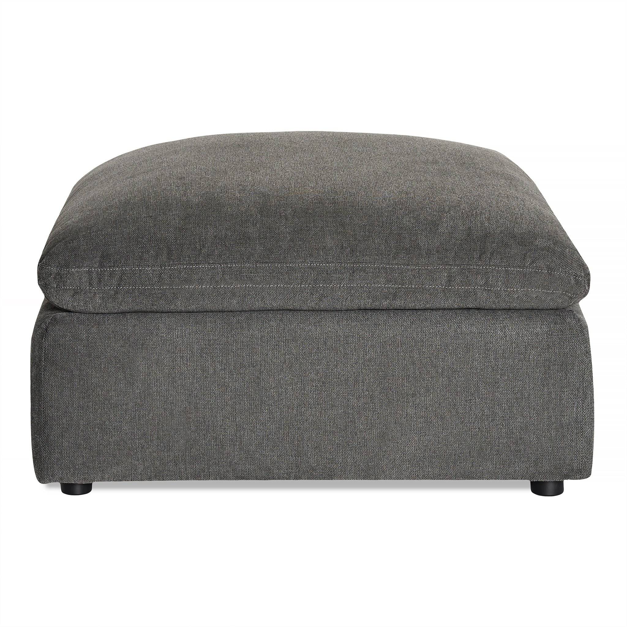 The My Cloud Slope 40 Ottoman offers large, square gray comfort with its cushioned top. It features a sleek fabric finish and short black legs, making it perfect customizable furniture for any living room or lounge with its simple, modern design.