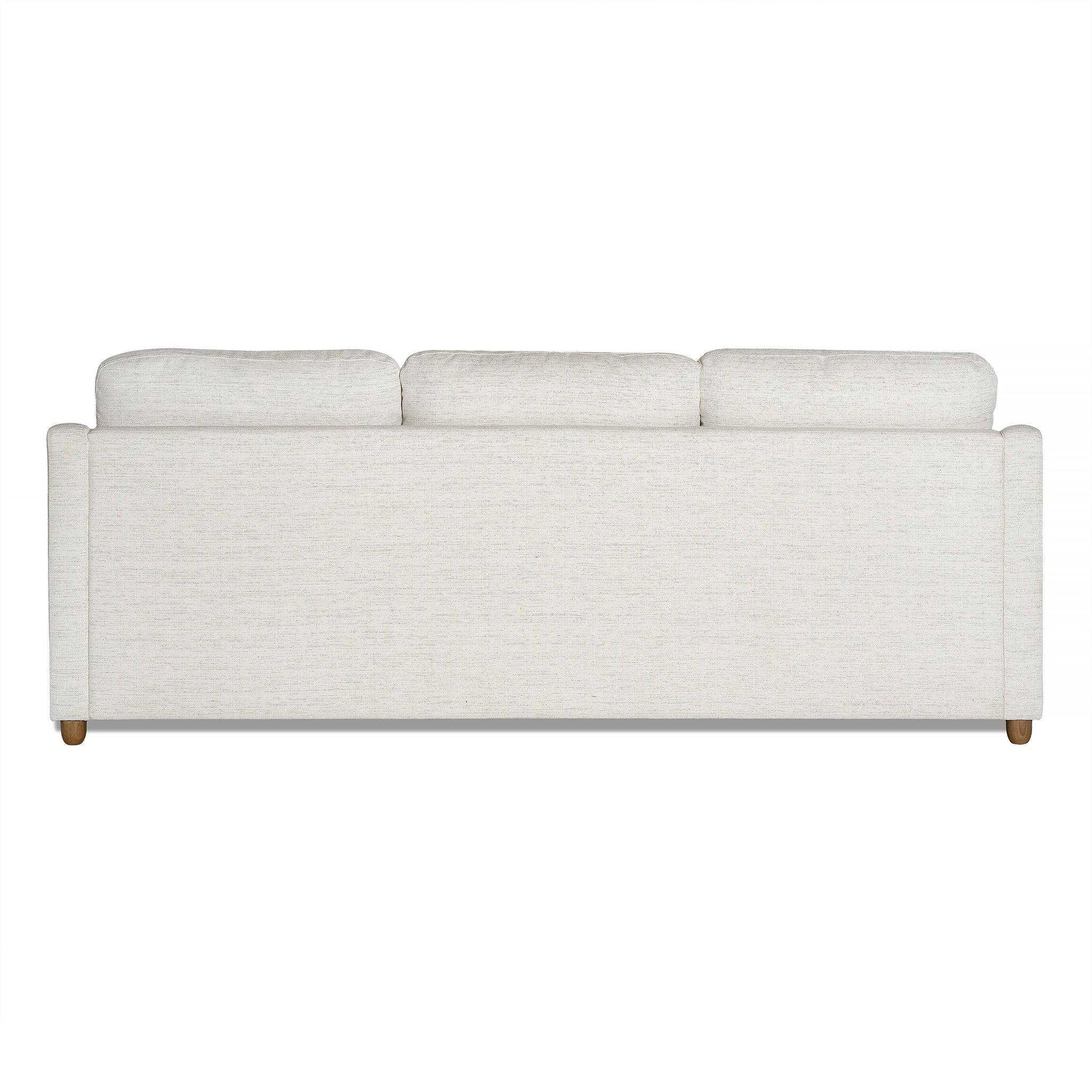 The My Cloud Slope Sofas back view features three cushions, wooden legs, and a modern off-white design. Its covers are machine-washable, set against a plain white background for an elegant look.