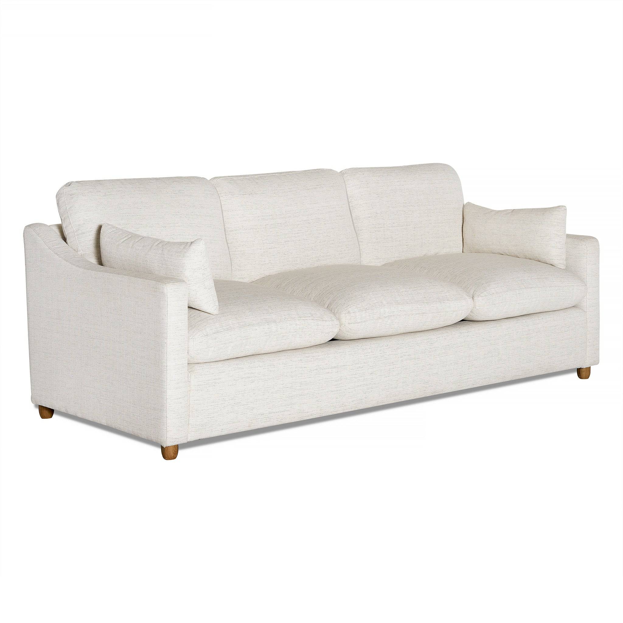 The My Cloud Slope Sofa is a three-seater with light beige fabric, plush cushions, matching throw pillows, curved armrests, and wooden legs. Its machine-washable covers add practicality to its style.