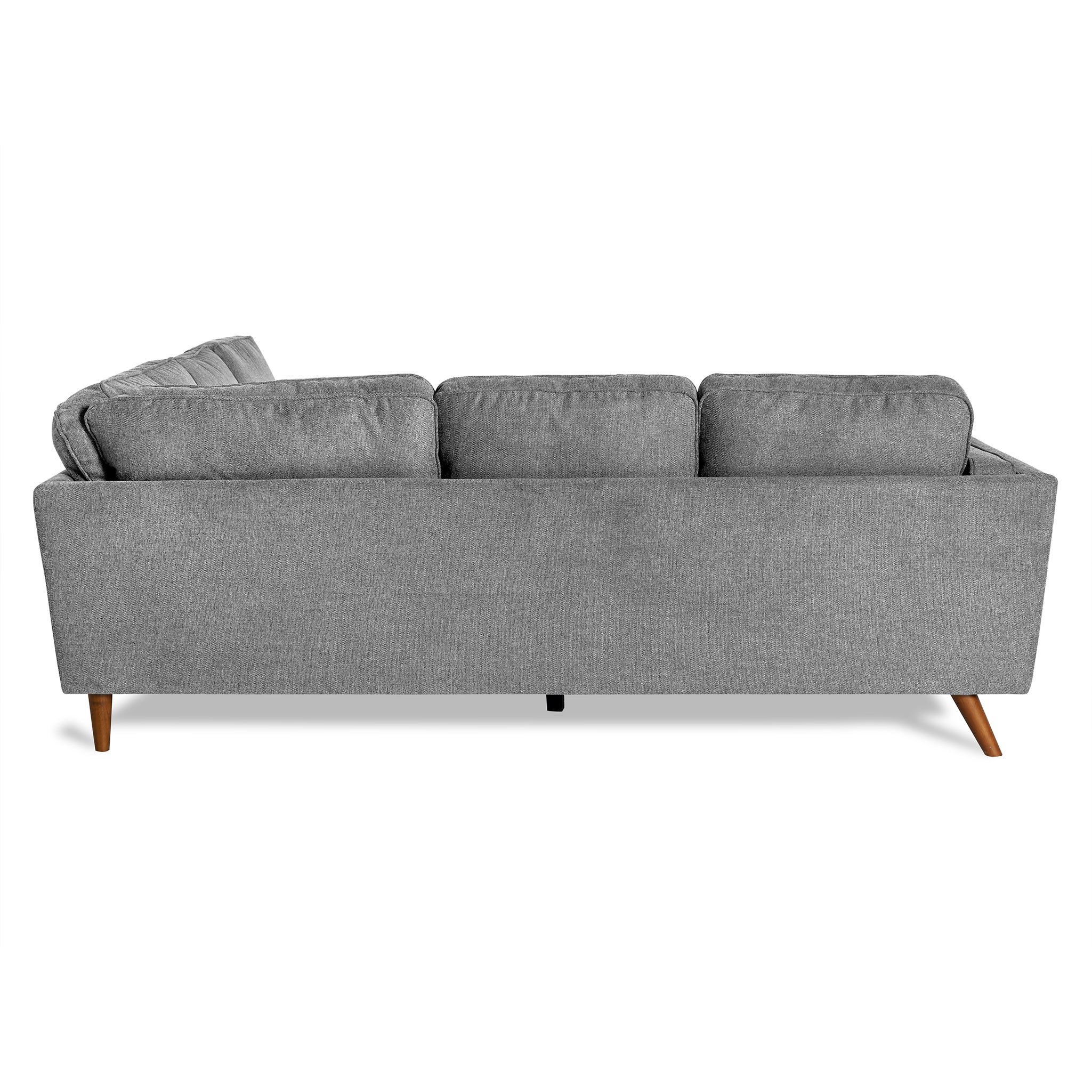 The Maddox Sectional, a modern gray fabric sofa with a mid-century vibe, features three cushions and rests elegantly on four wooden legs, making it perfect for any living room.