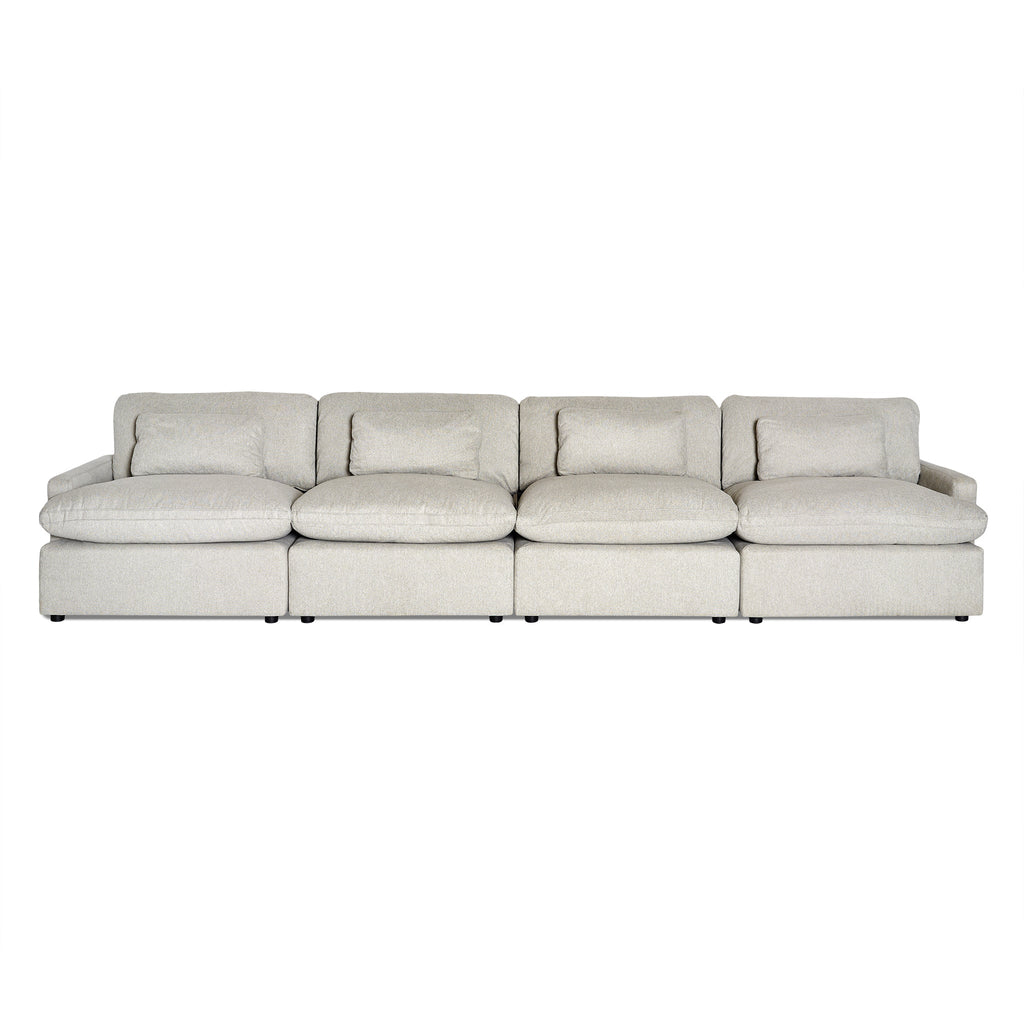 The My Cloud 4 Piece Straight is a beige sofa with four sections, plush cushions, and low armrests. Its minimalist design features machine-washable fabric for easy adaptation to various interiors. Explore the Worlds Greatest & Most Comfortable Sofa for your home today.