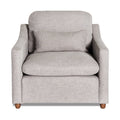 The My Cloud Slope Chair is a plush, light gray armchair with a matching seat cushion. It features contemporary design elements, soft curved armrests, and wooden legs, providing customizable comfort and style in a chic seating option.