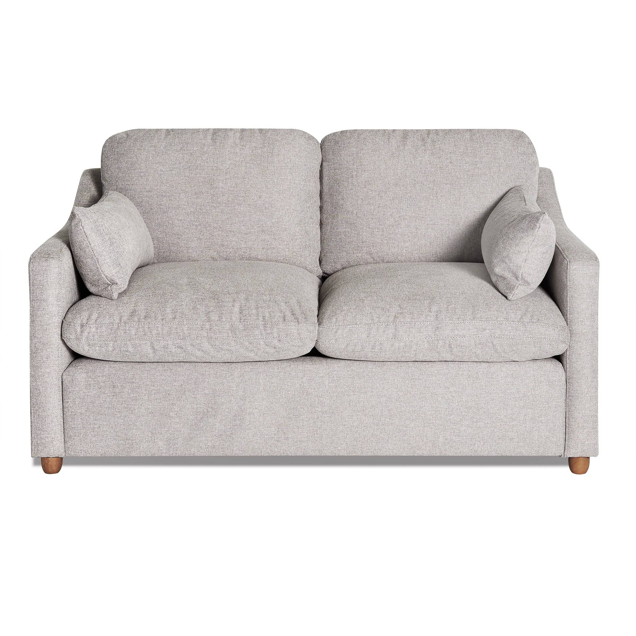 The My Cloud Slope Loveseat, part of the customizable collection, is a light gray upholstered piece with wooden legs. It features two cushions, armrests, and two small side pillows for a cozy look against a white background.