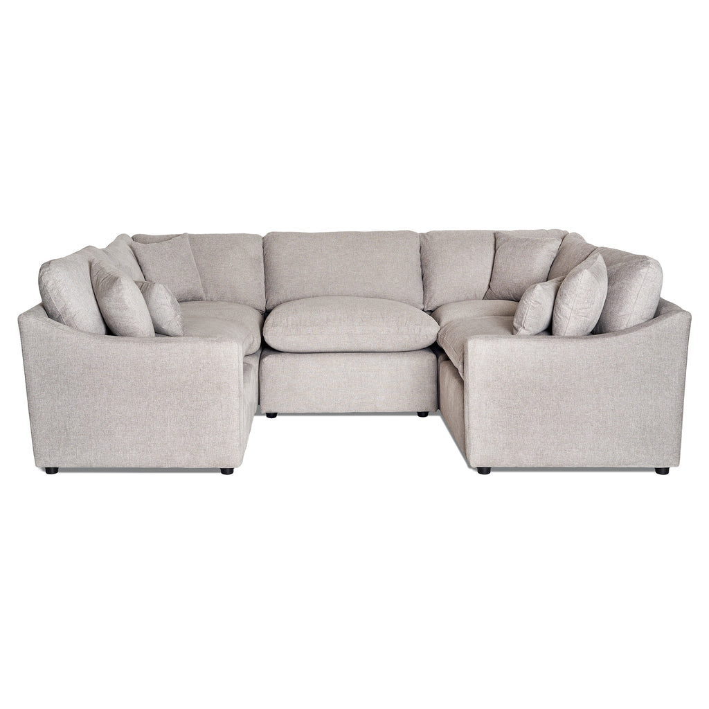 Introducing the My Cloud Slope 5 Piece Pit: a large beige U-shaped sectional designed with a modern low backrest and multiple cushions. Its clean, neutral look fits perfectly in any contemporary living room setting, ensuring supreme comfort.