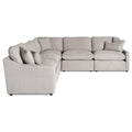 The My Cloud Slope 5 Piece L is a large, L-shaped beige sectional sofa with multiple cushions. Its clean, modern design and soft fabric upholstery invite relaxation and style into any living space, all set against a plain white background.
