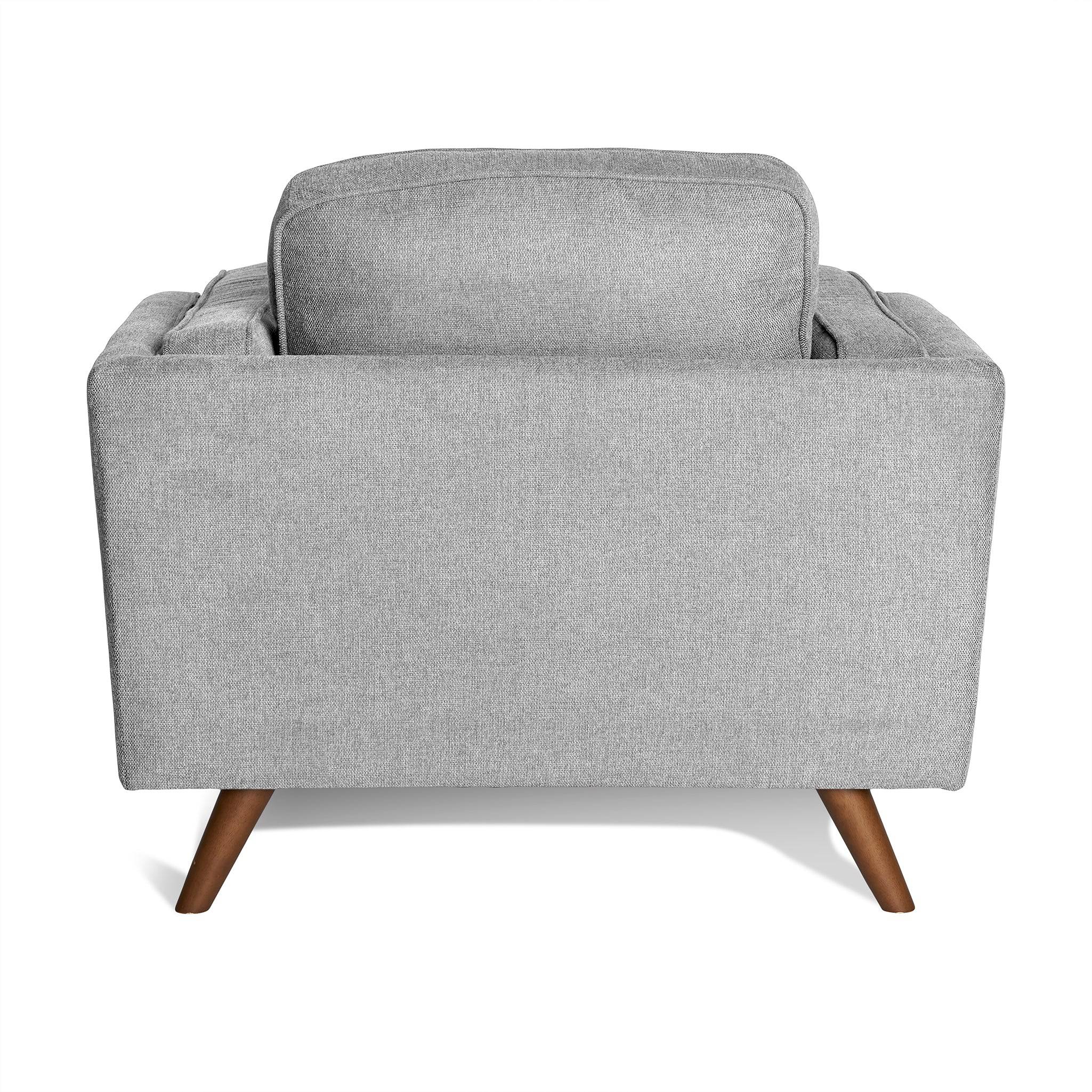 The Maddox Chair is a light gray fabric armchair showcasing a clean, mid-century modern design from the back. It features tapered wooden legs and plush backrest cushions, offering a minimalist yet elegant look akin to the Maddox Sofa Set.