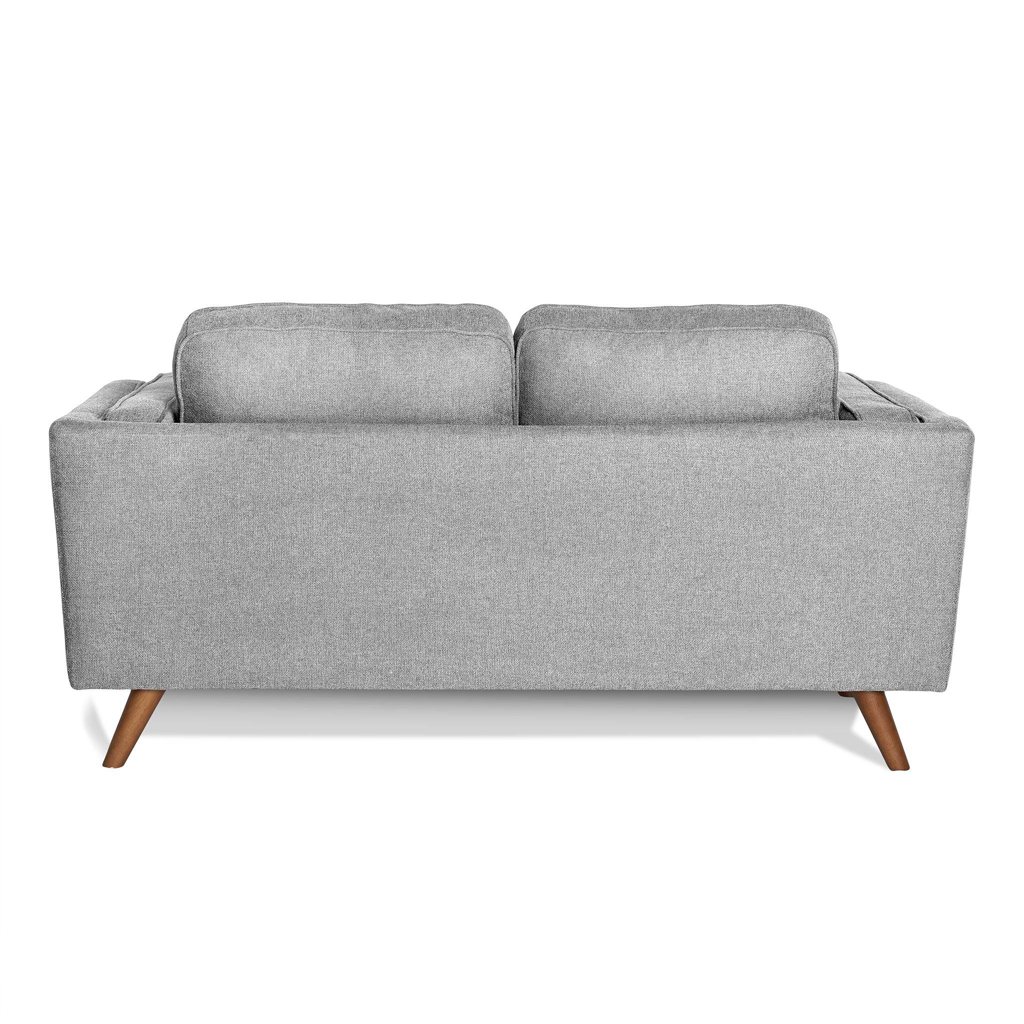 The image features the Maddox Loveseat from the back, highlighting its gray upholstery with two cushions, clean lines, durable build, and four wooden legs, exuding a timeless mid-century modern style.