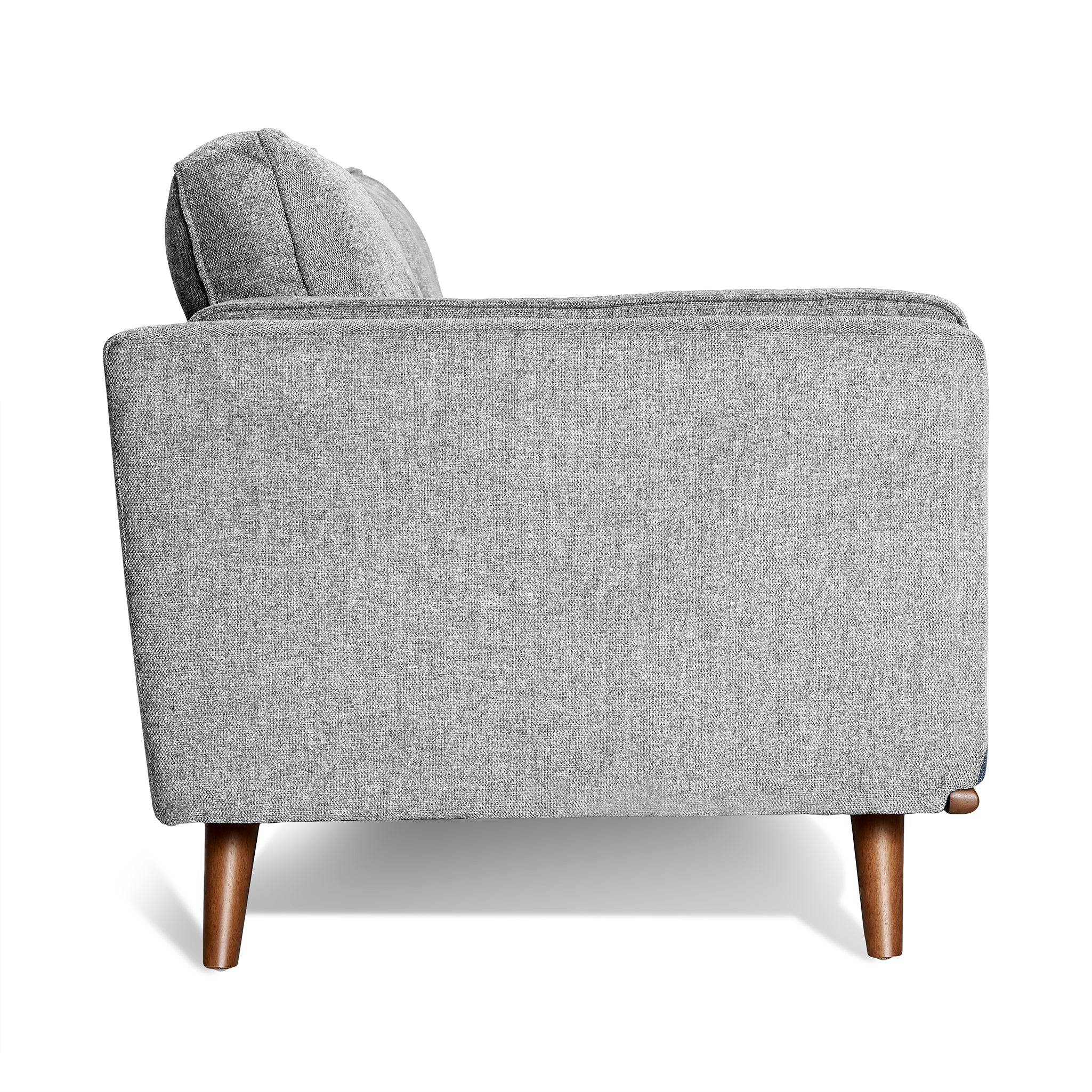 The Maddox Loveseat features a side view showcasing its modern gray upholstery with wooden legs. Its durable build and clean design emphasize the textured fabric and supportive backrest, while the wooden legs enhance its mid-century modern style.