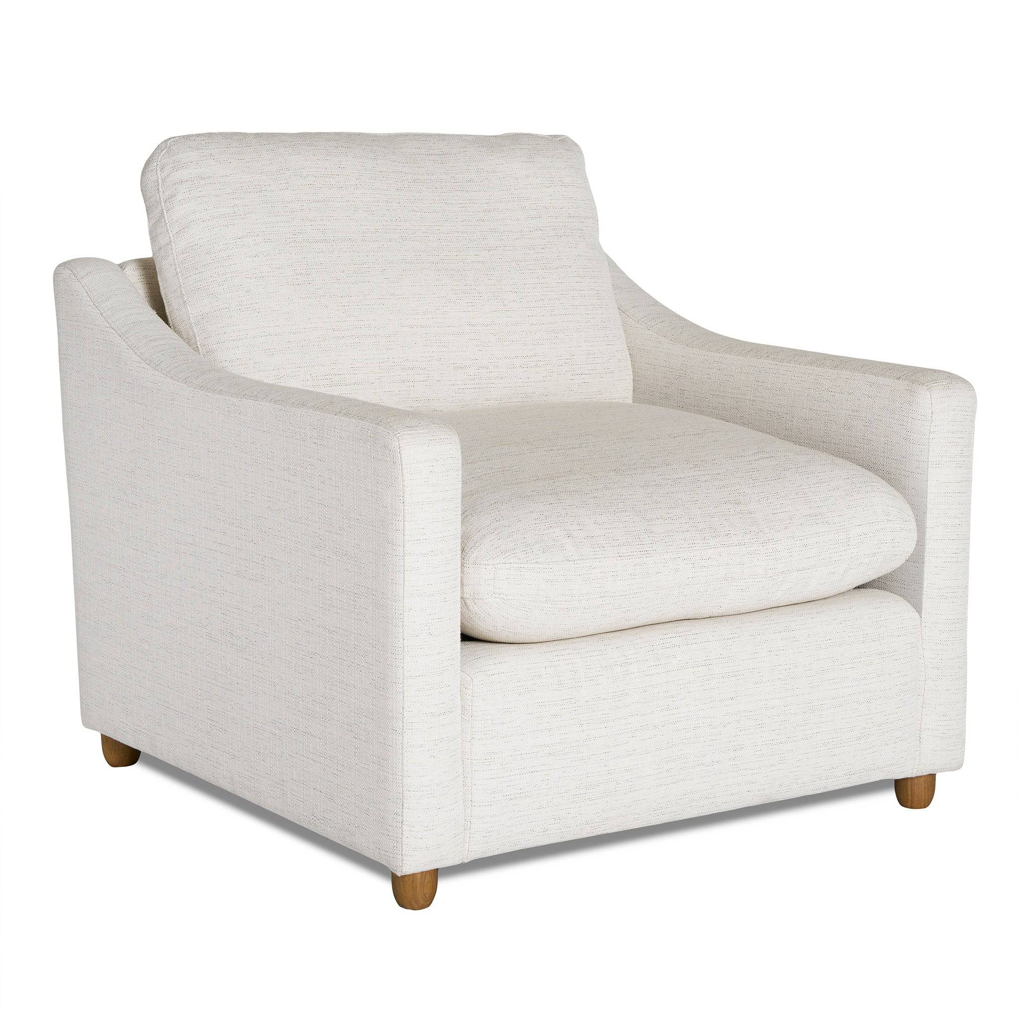 The My Cloud Slope Chair is a plush, white armchair with cushioned backrest and seat, sleek curved armrests, and short wooden legs. It combines customizable comfort with a modern design.