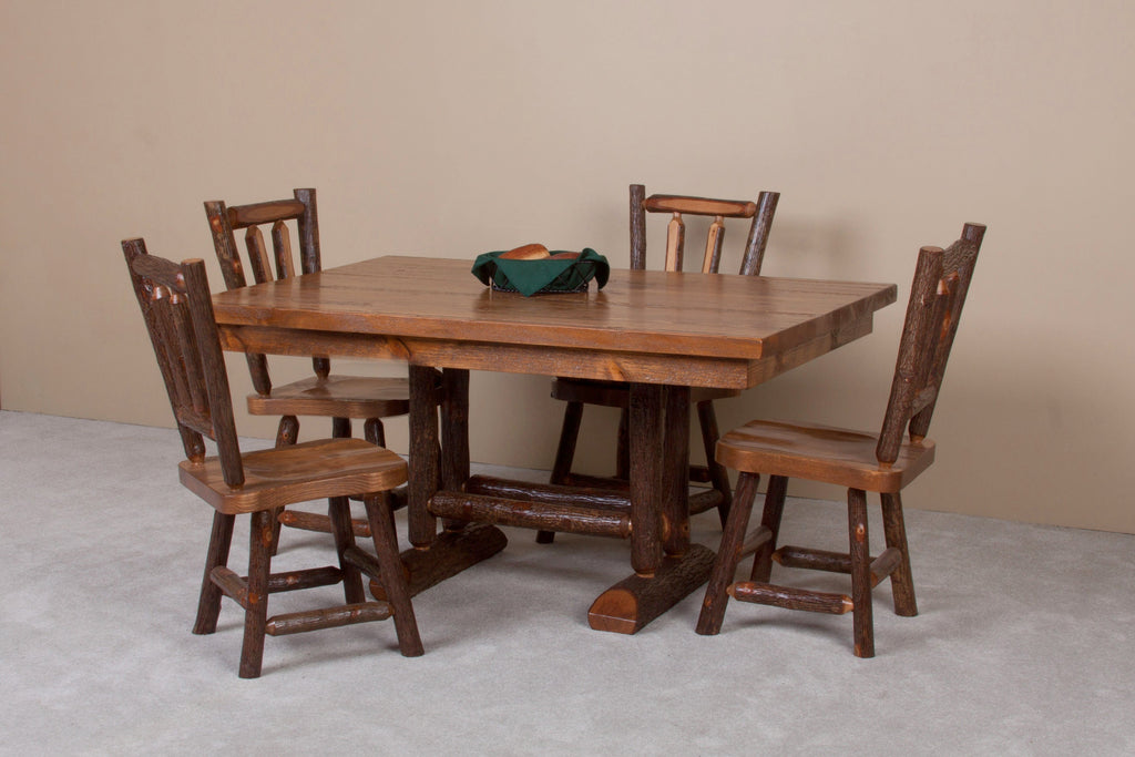 Sawtooth Hickory Trestle Dining Table styled with chairs