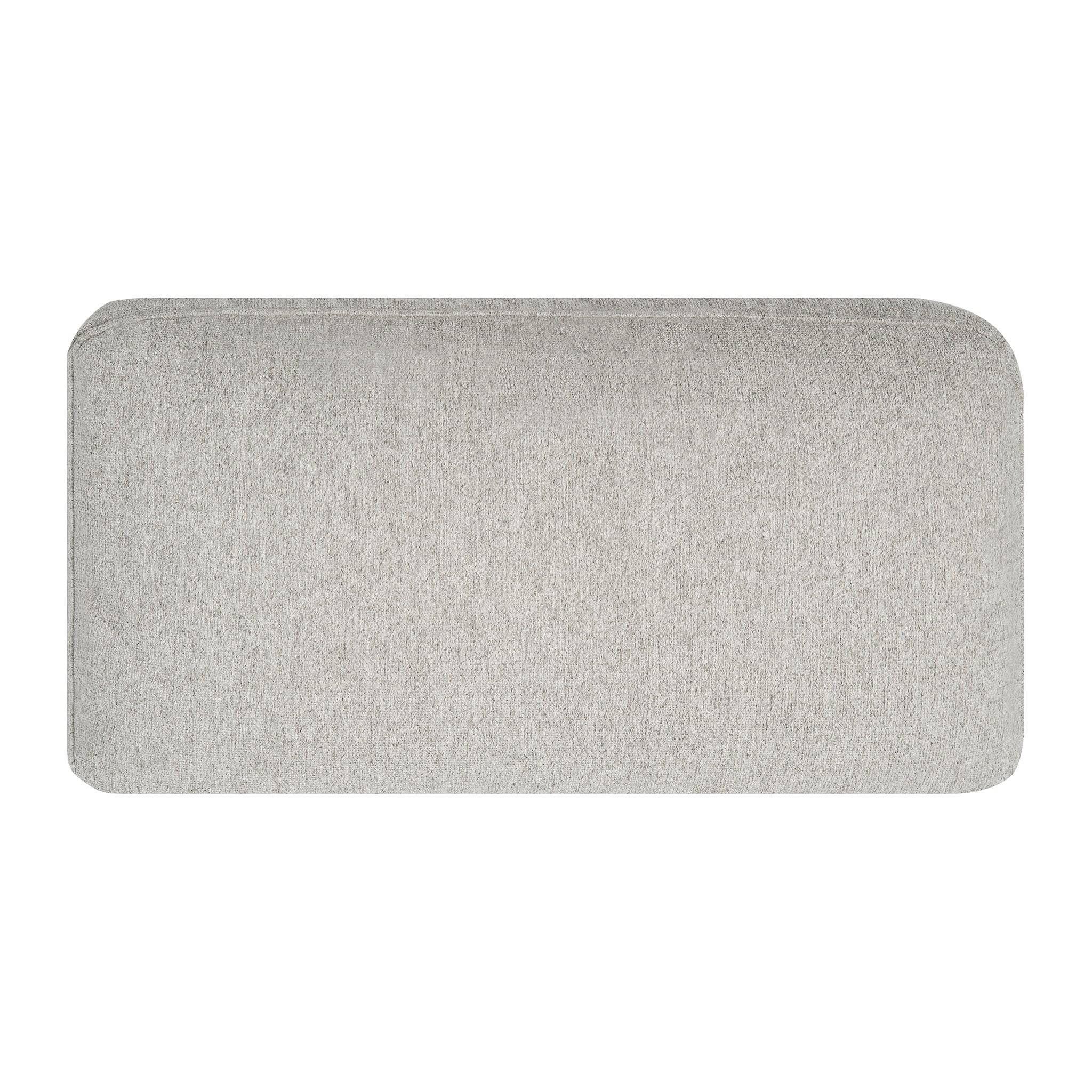 The My Cloud Pillow is a sleek rectangular gray door mat with rounded corners and a textured fabric surface. Its simple yet elegant design makes it an ideal complement for any sectional sofa, enhancing both indoor and outdoor spaces effortlessly.