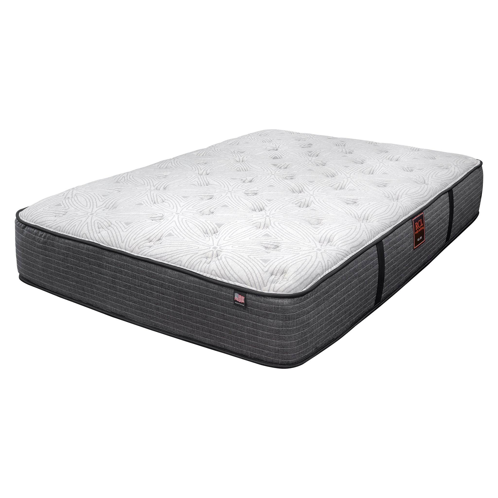 The My Cloud Mattress / 200 GF, a gray and white mattress with a patterned top layer, offers affordable luxury. It has dark side panels with handles for easy maneuvering, and its tufted, padded design ensures superior comfort.