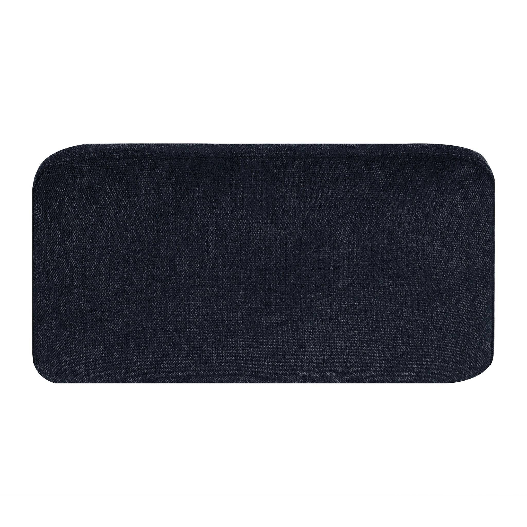 The My Cloud Pillow is a rectangular black cushion with rounded corners and a textured fabric surface, ideal as an accent piece for a sectional sofa. Its shown on a plain white background.